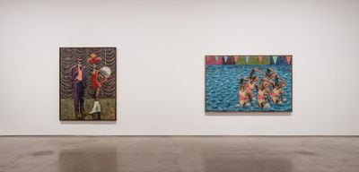 Two paintings by Derek Fordjour hang in a white gallery space. The left-hand painting is portrait format and pictures a woman in show dress accompanied by a man in a purple suit and bowler hat. The right-hand painting pictures a group of synchronised swimmers leaping out of a swimming pool. 