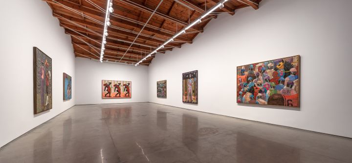Six large-scale paintings by Derek Fordjour hung in a white gallery class=