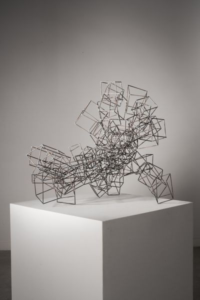 Welded steel sculpture showing cubes in space