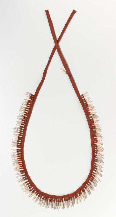 Maree Clarke and Leonard Tregonning, Thung-ung Coorang (Kangaroo teeth necklace) (2013). Kangaroo teeth, leather, sinew, earth pigment. 66.5 x 39.0 x 1.0 cm. National Gallery of Victoria, Melbourne. Purchased, Victorian Foundation for Living Australian Artists, 2014. © Maree Clarke.