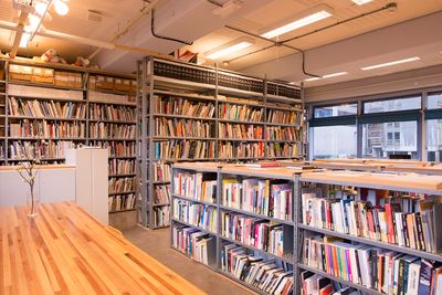 Shelves filled with books take up the Archive at de Appel in Amsterdam.