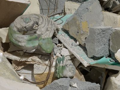 A close-up photograph of rubble in the gallery space that makes up an installation by Yu Ji.
