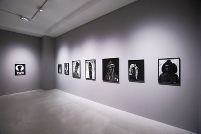 Exhibition of Zanele Muholi artworks hung vertically across Pearl Lam Galleries in Hong Kon