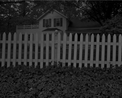 Dawoud Bey, Untitled #1 (Picket Fence and Farm House) (2017). From the series 'Night Coming Tenderly, Black'. Rennie Collection, Vancouver. © Dawoud Bey.
