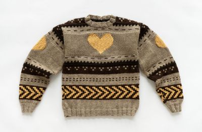 Wool sweater hand-knit by the artist. Dimensions variable.