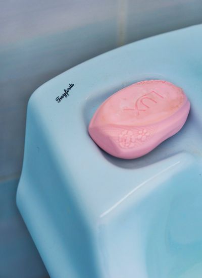 Farah Al Qasimi, Lux Soap in Blue Bathroom (2018). 27.9 x 20.3 cm. Edition of 5 + 2AP.