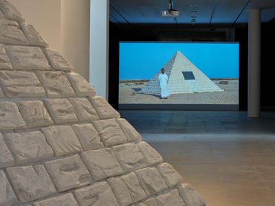 Heba Y. Amin, The Devil's Garden: Marseille's Pyramid (2019). Mixed media: pyramid replica, 370 x 370 x 240 cm; H.D. video with subtitles. 6 min, 18 sec. Exhibition view: Fruit from Saturn, Center for Persecuted Arts, Solingen (15 November 2019–2 February 2020).