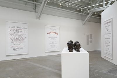 Left to right: Ken Lum, 'Necrology' series (2016–ongoing). Archival inks on Hahnemuhle Rag ultra-smooth paper. 241.3 x 172.7 cm; 13 Tragic Philadelphians (2015). Bronze sculptures. Exhibition view: What's old is old for a dog, CCA Wattis Institute for Contemporary Arts, San Francisco (15 March–12 May 2018).