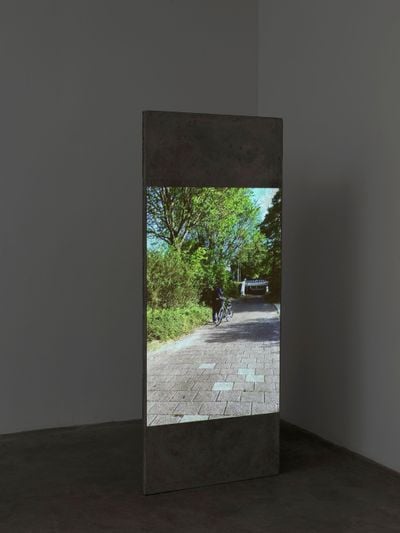 Mire Lee, Mom in Amsterdam (2022). Video and concrete. 180.3 x 573.7 x 5.1 cm. 2 min, 51 sec. Edition 1/3. Exhibition view: Carriers, Tina Kim Gallery, New York (15 September–22 October 2022).