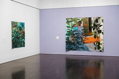 Left to right: Njideka Akunyili Crosby, Dwellers: Cosmopolitan Ones (2022); Still You Bloom in This Land of No Gardens (2021). Exhibition view: Blanton Museum of Art, Austin (23 July–4 December 2022).