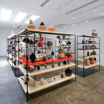 Pinaree Sanpitak, House Calls (2020). Mulberry paper, needle, found objects, and interchangeable shelves. Dimensions variable. Exhibition view: 100 Tonson Foundation, Bangkok (2020–2021).