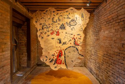 Citra Sasmita, Timur Merah Project II: The Harbor of Restless Spirits (2019). Ink on cow leather and writing on turmeric. Exhibition view: Kathmandu Triennale 2077 (11 February–21 March 2022).