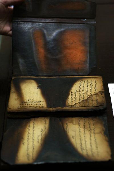 Shubigi Rao, From The Wood for the Trees (2018). Burnt Oriental manuscript from the destruction of the Oriental Institute in Sarajevo in 1992.