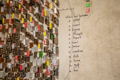 Wallen Mapondera, Kumba Kwababa Vangu II (2023) (detail). Cardboard boxes, waxed thread, and packaging tape on canvas. 184 x 379 x 8 cm.