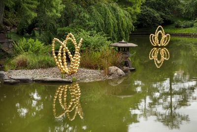 Jean-Michel Othoniel, 'Gold Lotus' series (2023). Exhibition view: The Flowers of Hypnosis, Japanese Hill-and-Pond Garden, Brooklyn Botanic Garden, New York (18 July–22 October 2023). © Jean-Michel Othoniel/ADAGP, Paris, and ARS, New York 2023.
