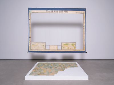 Sung Neung Kyung, 세계전도, 世界顚倒, An Upside-Down Map of the World (1974). Paper map. 80 x 180 x 10 cm. © Sung Neung Kyung.