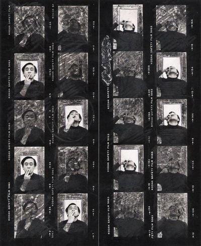 Sung Neung Kyung, Smoking - contact print (1976). Contact print. 20.1 x 16.5 cm. © Sung Neung Kyung.