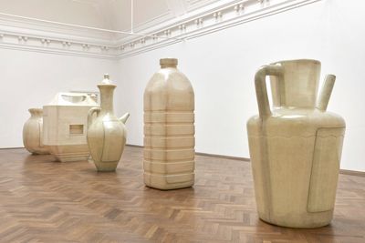 Alia Farid, In Lieu of What Is (2022). Polyester resin and fibreglass. Lota 190 x 190 x 240 cm; jerry can 91 x 233 x 255 cm; juglet 125 x 125 x 297 cm; water bottle 100 x 100 x 295 cm; pitcher 145 x 145 x 245 cm. Exhibition view: In Lieu of What Is, Kunsthalle Basel, Switzerland (11 February–22 May 2022). Photo: Philipp Hänger.