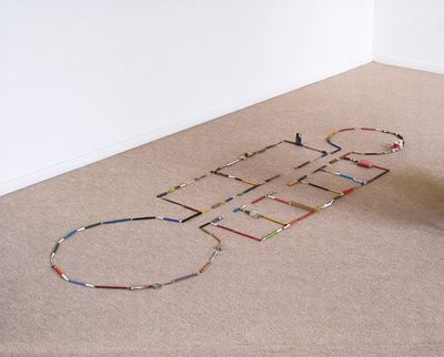 Mark Manders, Inhabited for a Survey (First Floor Plan from Self-Portrait as a Building) (1986). Writing materials, erasers, painting tools, scissors. 80 x 267 x 90 cm.