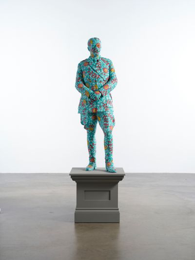 Yinka Shonibare, Decolonised Structures (Kitchener) (2022). Fibreglass sculpture, hand-painted with Dutch wax pattern and wooden plinth. 141 x 47 x 48.5 cm. © Yinka Shonibare.