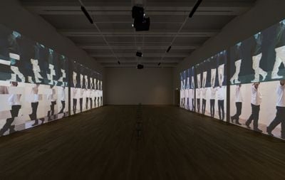 Bruce Nauman, Contrapposto Studies, I through VII (2015/2016). Seven-channel video (colour, sound, continuous duration). © 2024 Bruce Nauman / Artists Rights Society (ARS), New York. Jointly owned by Pinault Collection and the Philadelphia Museum of Art. Photo: Jimmy Ho.