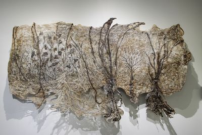 Jayashree Chakravarty, Breathe closer to the skin 4 (2023). Cotton fabric, Nepali paper, jute, tissue paper, tea stain, dry leaf, acrylic colour. 58.5 x 101.5 cm.