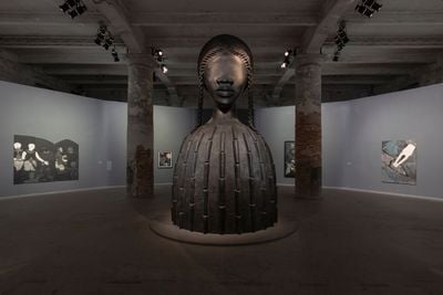 Front to back: Simone Leigh, Brick House (2019); Belkis Ayón. Exhibition view: 59th International Art Exhibition – La Biennale di Venezia, The Milk of Dreams, Venice (23 April–27 November 2022).