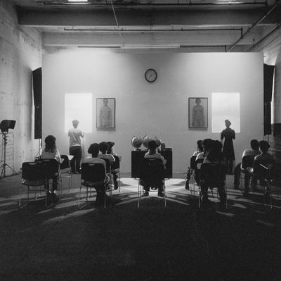 Carrie Mae Weems, A Class Ponders the Future from 'Constructing History' (2008). © Carrie Mae Weems.