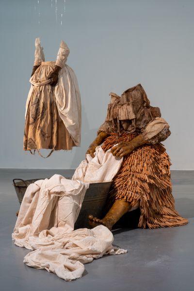 Shannon Alonzo, Lowest Hanging Fruit; Washerwoman (both 2018). Exhibition view: 12th Liverpool Biennial, uMoya: The Sacred Return of Lost Things, Tate Liverpool (10 June–17 September 2023).