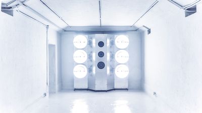 Zhang Ding, SAFE HOUSE #3 (2018). Aluminium, birch, speakers, power amplifier, frequency divider, LF electrodeless lamp. 200 x 202.4 x 49.5 cm x 5.
