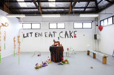 Truc Truong, Let Em Eat Cake (2022) (detail). Various objects on spinning altar, pig intestines, wool. Exhibition view: Liverpool Street Gallery, Adelaide (2022).