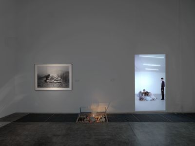 Left to right: Ma Liuming, To Add One Meter to an Anonymous Mountain (1995); Zhang Yibei, Bring me something I don't care (2023); Isaac Chong Wai, Falling Reversely (2021). Exhibition view: Bodily Reaction: Vitalizing the Bare Life