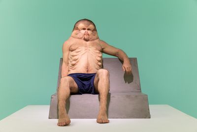 Patricia Piccinini, Graham (2016). Silicone, fibreglass, human hair, clothing, concrete. 140 x 120 x 170 cm. Transport Accident Commission, Australia. Exhibition view: Supernatural: Sculptural Visions of the Body, Taipei Fine Arts Museum (18 February–4 June 2023).