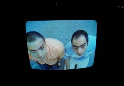 The Callas, Beware of the Dogs (2001). Video loop presented on TV monitor.