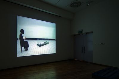 Araya Rasdjarmrearnsook, Reading Inaow for Female Corpse (Lament Series) (1997). Single-channel video with sound. 7 mins. Exhibition view: The Unfaithful Octopus: Image-Thinking and Adaptation, ADM Gallery, Nanyang Technological University, Singapore (12 October–1 December 2023).