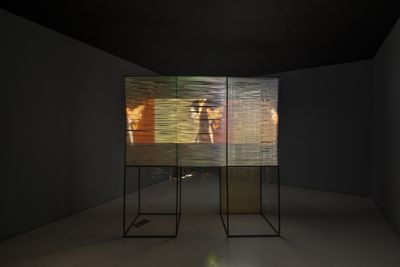Erika Tan, The 'Forgotten' Weaver (2017). Video installation with the strap weaving and metal structure. 70 x 210 x 211,5 cm. 19 min 47 sec loop.
