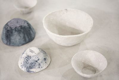 Nienke Hoogvliet, Waterschatten bowls (2020). Used toilet paper, natural glue and Vivianite paint.