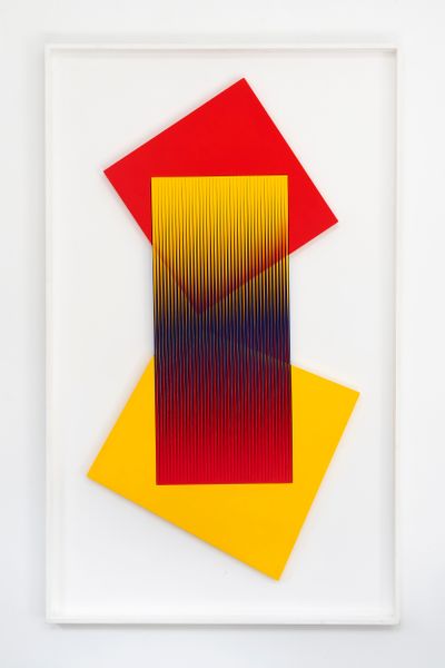 Alberto Biasi's geometric artwork titled with red and yellow accent being exhibited at M77 in Milan