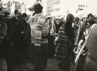 A group of protesters against Corrie anti-abortion bill are pictured in a black and white archival photograph.
