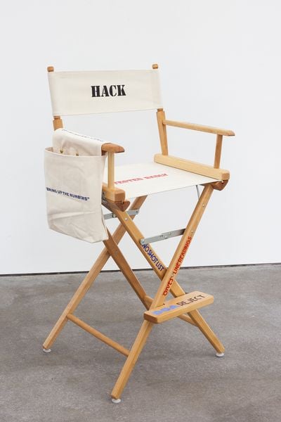 John Waters, Bad Director's Chair (2006). Canvas, wood, steel, paint with leather bound script. 116.8 × 62.2 × 55.9 cm. © John Waters.