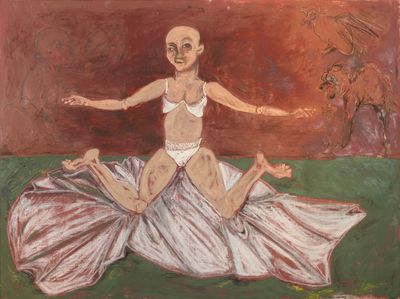A figure sits on a cloth on a floor with their legs splayed. 