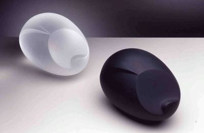 Two egg-shaped sculptures by Constantin Brancusi, one black and the other white, have been recreated by Sherrie Levine.