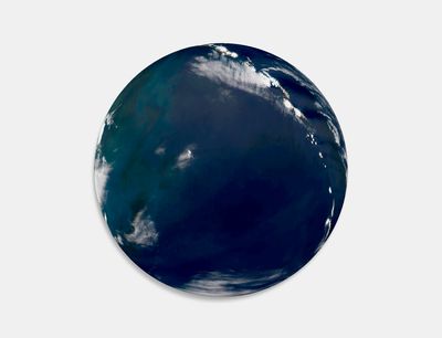Artist Elizabeth Thomson circular fibreglass and resin work depicting smudges of white clouds on a dark blue sky or ocean background