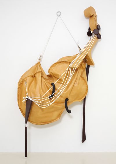 Claes Oldenburg and Coosje van Bruggen, Soft Viola (2002). Canvas, wood, urethane foam, coated with resin and painted with latex; clothesline, hardware. 264.2 x 152.4 x 55.9 cm. Overall dimensions variable. © Claes Oldenburg and Coosje van Bruggen.