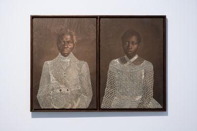 Sasha Huber, Tailoring Freedom (2021). Metal staples on photograph on wood. 97 x 69 cm.