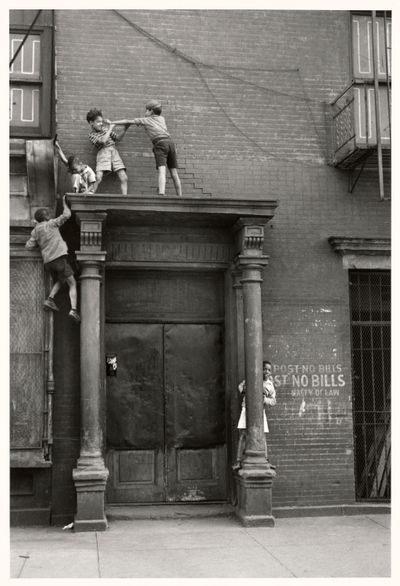 Helen Levitt, New York (Boys fighting on a pediment) (c.1940). Gelatin silver photograph. 31.8 × 21.1 cm. Collection National Gallery of Victoria, Melbourne; Bowness Family Fund for Photography, 2022.