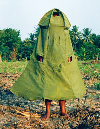 Mella Jaarsma, Refugee Only (2003). Cow leather, iron, fabric, personal items (toothpaste, brush, soap, torch, knife, sanitary napkins, etc). 30 x 300 cm.