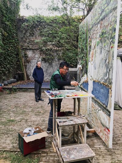 Liu Xiaodong working on a painting of Ah Cheng, October 7, 2020.