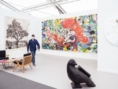 (Left) William Kentridge, All That Breathes (2021). Indian Ink and pencil on phumani. (Centre) Misheck Masamvu, Pink Gorillas in Hell Are Gods (2019). Oil on canvas. 280 x 550cm. Booth view: Goodman Gallery, Frieze Los Angeles (17–20 February 2022).