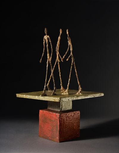 Alberto Giacometti, Trois hommes qui marchent (Grand plateau) (conceived in 1949, cast by 1952). Painted bronze. Estimate: $15–20 million.
